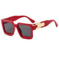 Modern oversized square sunglasses with red frames and dark grey lenses in 45-degree view - Red Frame Dark Grey Lens