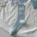 Light blue ballet style mid-calf socks with white ribbons and 3D floral accents - One Size / Button Blue