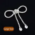 Large vintage silver bow brooch with sparkling rhinestones and elegant drop tassels - Large Size - Water Drop Pendant