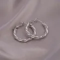 Silver-colored twisted rope hoop earrings with woven texture and secure leverback closure - E-070---Platinum