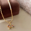 Detail of gold pony pendant with colorful zircons on a mixed pearl and bead necklace - Gold Necklace - Colorful Puppy Pendant