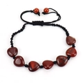 Detailed view of hand-woven heart-shaped red jasper stone beaded bracelet with adjustable cord - Red Jasper Heart / Red