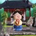 Traditional praying figure figurine with red beads and blue-yellow robes, size 6.6x6.5x11.5cm - Large Suoyuan (D1213-6)