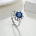 Silver ring featuring a large oval blue spinel center stone with sparkling diamond halo - Blue Spinel 113 - Silver