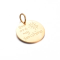 Golden round 'you are my sunshine' stainless steel pendant with sun engraving - Gold