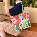 Canvas tote bag in blue with colorful Forest cartoon illustration for women - Frog and Bird Agreement