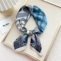 Blue and beige geometric knit pattern silk scarf tied in an elegant bow knot - Blue Knit Print