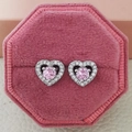 Macro shot of pink heart-shaped earrings with zircon accents in an octagonal velvet box - Heart Pink Style (e710)