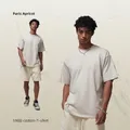 Oversized 190G cotton T-shirt in Paris Apricot color featuring a loose drop-shoulder fit - S / Paris Apricot