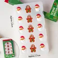 Christmas sugar icing decorations featuring Santa and Gingerbread Man in a 15-piece tray - 15 Pieces Per Box / Icing Decorations Large Christmas AB