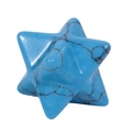 Detailed macro shot of a polished turquoise Merkaba star showing natural black veins - Turquoise