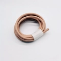 Close-up of 6mm beige PU leather cord with fine stitching for DIY bag handles and crafts - Khaki