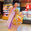 Cartoon cube keychain with purple silicone strap and rotating cube charm for bags - Cute Rabbit Magic Cube / Purple