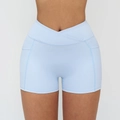 Light blue high waisted yoga shorts with crossover waistband and side pockets - S / Bottoms / Water Blue