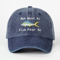 Close-up of Fish Fear Me embroidery on a washed navy blue denim baseball cap - Adjustable / Navy Blue