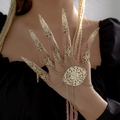 Bracciale gotico dorato con anelli ad artiglio e dettagli in filigrana traforata - Stile Dorato (2026)