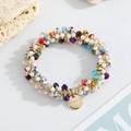 Detail of beaded hair tie featuring colorful crystals, pearls and a Hand Made metal tag - Rainbow Color Crystal Pearl Style
