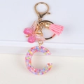 Glitter resin initial C keychain with pink butterfly pendant and tassel accessory - Letter C