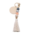 Bohemian keychain with round wood disc, colorful beads, and large white cotton tassel - White
