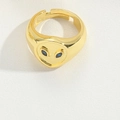 Retro golden alien ring with blue gemstone eyes and adjustable open band design - Alien