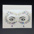 Iridescent rhinestone face jewels for eyes decoration on transparent backing - Model 1056