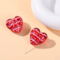 Dettaglio di perline in vetro a forma di cuore con motivi a pois rossi e rosa per gioielli - Stile a Pois e Onde Viola
