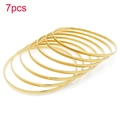 7er Set minimalistische, 18 Karat vergoldete Edelstahl Armreifen zum Stapeln für Damen - Innendurchmesser 55mm / 3mm Gold (7 Ringe)
