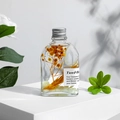 Luminous aromatherapy jar with yellow dried flowers and white wax in a glass bottle - Miss Coco