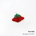 Christmas pearl bell ornament made of red felt with green holly leaves and white pearls - Pearl Bell