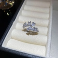 Silver open ring featuring asymmetric zircon stones in pear, square, and round cuts - Style 107 Silver (Mixed Cut Stones)