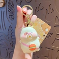 Portachiavi cartoon giallo con borsa a forma di burger e moschettone in metallo dorato - Maialino Beige che Soffia Bolle