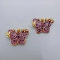 Pendente farfalla dorato con ali rosa glitterate e dettagli floreali metallici - Rosa Loto