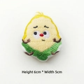 Detail of 6x5cm cartoon corn plush brooch with cute embroidery on white background - Corn