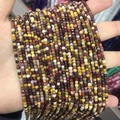 Mix of 2-3mm square natural stone crystal beads held in hand for DIY jewelry making - 33-Yellow Jasper (Natural)