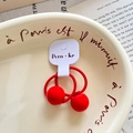 Elastic red hair ties featuring large polished beads on a premium branded white card - Red Candy Color