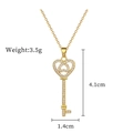 Detailed size view of luxury gold heart key necklace with sparkling stones and chain dimensions - Gold