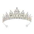Detail of silver bridal crown featuring intricate filigree and teardrop rhinestone - Silver