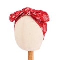 Macro detail of red Christmas baby headband with white snowflake prints and a large bow - Red Winter Snowflake Print Style (20955)