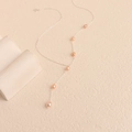 Elegant Y-shaped necklace with silver chain and lustrous pink freshwater pearls - Silver Pearl Style
