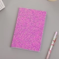 Chic purple glitter notebook with shimmering sequins and pink gel pen as accessory - Purple