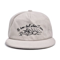 Detail of corduroy texture and cactus embroidery with 'No home but where I roam' text - White
