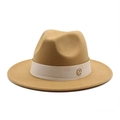 Detail of wool fedora hat with beige decorative band and golden metal M emblem - Camel