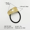 Detailed view of gold metal hairband with dimensions 1.95 inch by 0.95 inch - Diagonal Rhombus Brushed / Gold