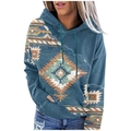 Close-up of vintage geometric pattern and soft brushed fabric on teal hoodie for women - S / Lake Blue