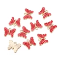 Dettaglio di dieci ciondoli a farfalla in smalto rosso e lega dorata per gioielli fai-da-te - 16*12mm / Rosso