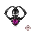 Gothic black S925 sterling silver skeleton bead with pink heart stone and zircon eyes - Heart-Holding Skeleton (SCC3182)