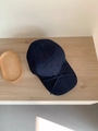 Close-up of a navy blue quick-dry baseball cap featuring a delicate bow tie decoration - One Size Adjustable (56-58cm) / Navy Blue