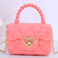 Pink mini jelly tote bag with quilted pattern, rope handle, and gold heart lock - Pink