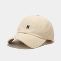 Close-up of embroidered black letter N on beige baseball cap with precise stitching - Adjustable / Beige
