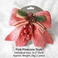 Pink sequin Christmas bow decoration with pine cone and berry detail, 16.5x19cm - Pink Pine Cone Christmas Bow